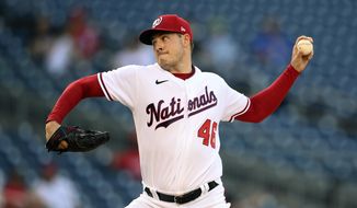 Washington Nationals starting pitcher Patrick Corbin delivers a pitch during the first inning of a baseball game against the Pittsburgh Pirates, Tuesday, June 15, 2021, in Washington. (AP Photo/Nick Wass)