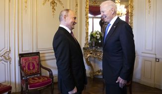 Russian president Vladimir Putin, left, talks with US president Joe Biden, right, during the US - Russia summit in Geneva, Switzerland, Wednesday, June 16, 2021. (Peter Klaunzer/Keystone via AP)