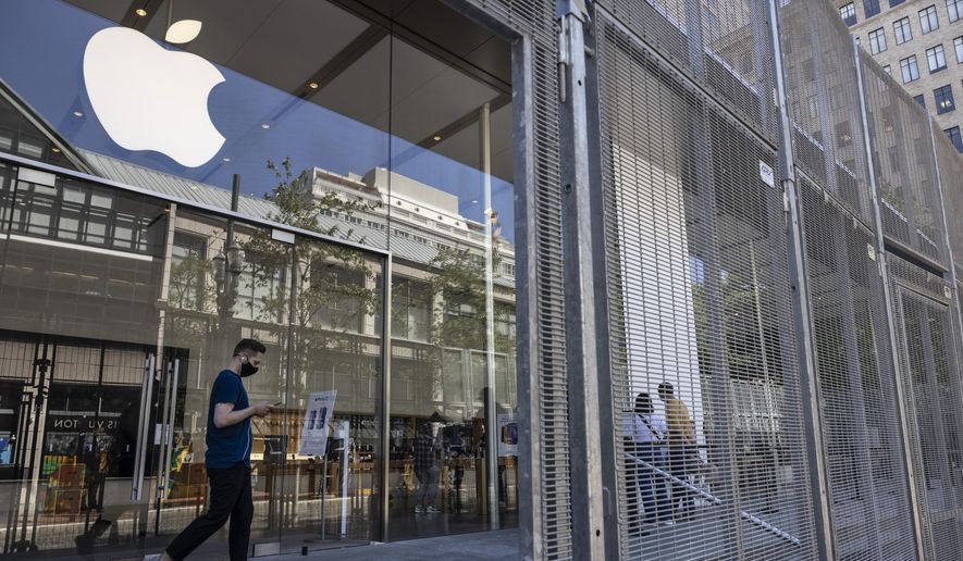 Security gates surround the Apple store on Thursday, June 3, 2021, in Portland, Ore., after the George Floyd protests. (AP Photo/Paula Bronstein) ** FILE **