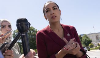 Rep. Alexandria Ocasio-Cortez, D-N.Y., speaks with reporters, Thursday, June 17, 2021, as she arrives on Capitol Hill in Washington. (AP Photo/Jacquelyn Martin) **FILE**