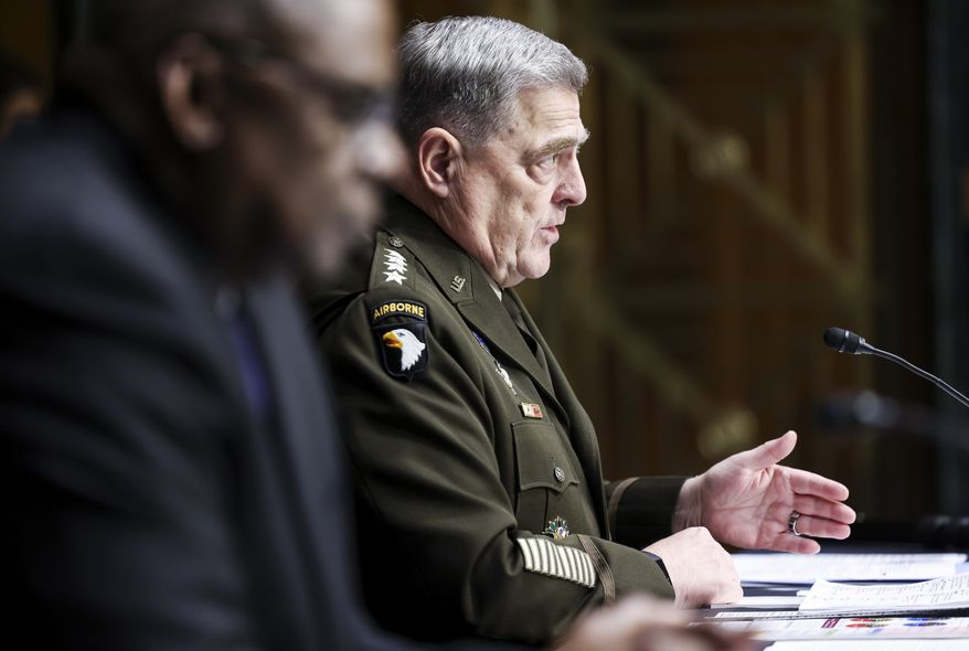 Secretary of Defense Lloyd Austin, left, and Chairman of the Joint Chiefs Chairman Gen. Mark Milley testify before a Senate Appropriations Committee hearing, Thursday, June 17, 2021, on Capitol Hill in Washington. (Evelyn Hockstein/Pool via AP)