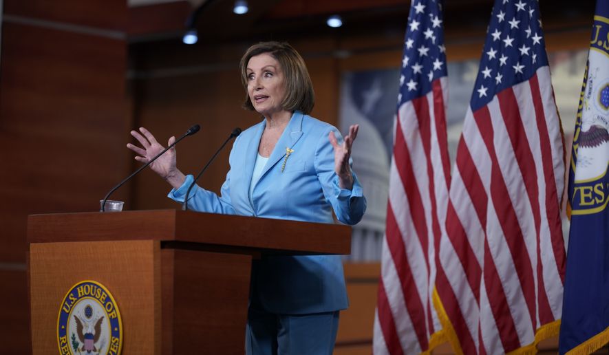 Speaker of the House Nancy Pelosi, D-Calif., talks to reporters just after the Supreme Court dismissed a challenge to the Obama-era health care law, at the Capitol in Washington, Thursday, June 17, 2021. (AP Photo/J. Scott Applewhite)