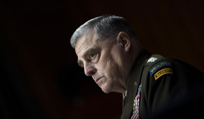 Chairman of the Joint Chiefs Chairman Gen. Mark Milley testifies before a Senate Appropriations Committee hearing to examine proposed budget estimates and justification for fiscal year 2022 for the Department of Defense in Washington on Thursday, June 17, 2021. (Caroline Brehman/Pool via AP) **FILE**