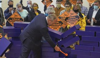 Liberal Democrat leader Ed Davey during a victory rally at Chesham Youth Centre in Chesham, England, Friday June 18, 2021, after Sarah Green won the Chesham and Amersham by-election. In a surprising result, Prime Minister Boris Johnson’s Conservative Party was easily defeated in a special election for a seat it has held onto for decades. (Steve Parsons/PA via AP)