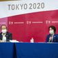 Tokyo 2020 CEO Toshiro Muto, left, and President Seiko Hashimoto attend the news conference after receiving a report from a group of infectious disease experts on Friday, June 18, 2021, in Tokyo. The experts including Shigeru Omi, head of a government coronavirus advisory panel, issued a report listing the risks of allowing the spectators and the measurements to prevent the event from triggering a coronavirus spread. (Yuichi Yamazaki/Pool Photo via AP)