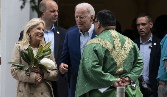 President Joe Biden and first lady Jill Biden speak with a priest as they depart after Mass at St. Joseph on the Brandywine Catholic Church, Saturday, June 19, 2021, in Wilmington, Del. (AP Photo/Alex Brandon)