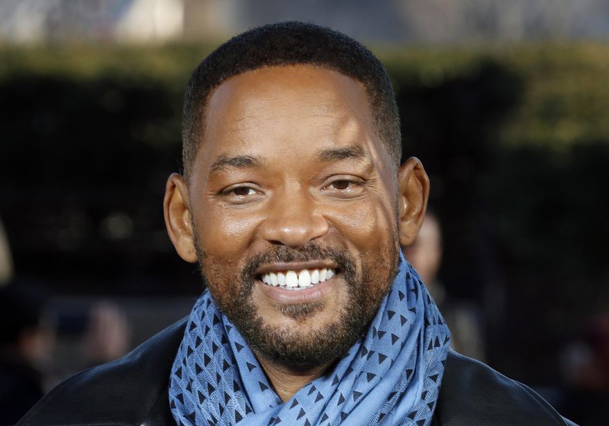 Will Smith poses for photographers during the photo call of &amp;quot;Bad Boys for Life,&amp;quot; in Paris. (AP Photo/Thibault Camus, File)