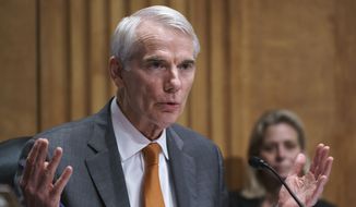 Sen. Rob Portman, R-Ohio, speaks during a Senate Homeland Security Committee hearing at the Capitol in Washington, Thursday, June 10, 2021. Portman is working with a bipartisan group of 10 senators negotiating an infrastructure deal with President Joe Biden. (AP Photo/J. Scott Applewhite)