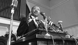 In this 1960 file photo, the Rev. Martin Luther King Jr. speaks in Atlanta. (AP Photo, File)