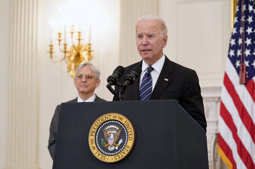 President Joe Biden during an event in the State Dining room of the White House in Washington, Wednesday, June 23, 2021, to discuss gun crime prevention strategy. Attorney General Merrick Garland listens at left. (AP Photo/Susan Walsh)