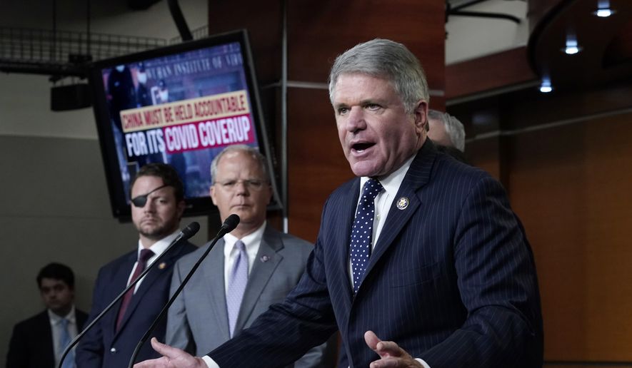 House Foreign Affairs Ranking Member Michael McCaul, R-Texas, joined from left by Rep. Dan Crenshaw, R-Texas, and Rep. Brett Guthrie, R-Ky., speaks at a news conference where Republicans charge China with a coverup of the origin of COVID-19, at the Capitol in Washington, Wednesday, June 23, 2021. (AP Photo/J. Scott Applewhite)