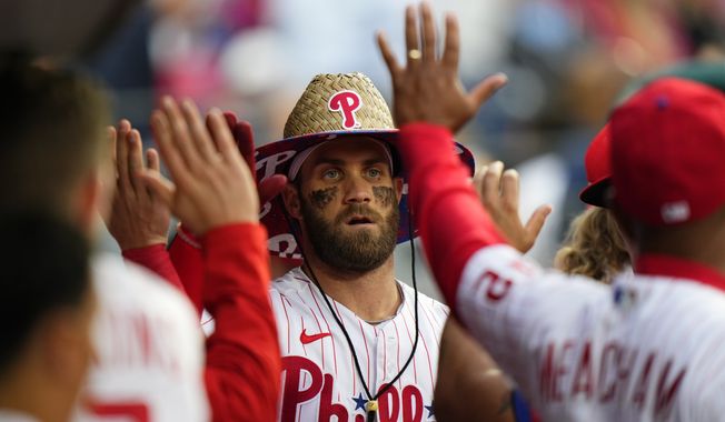 Philadelphia Phillies&#x27; Bryce Harper reacts after hitting a home run during a baseball game against the Washington Nationals, Tuesday, June 22, 2021, in Philadelphia. (AP Photo/Matt Slocum) **FILE**