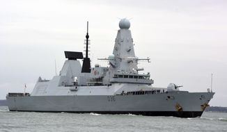 This March 20, 2020, photo shows HMS Defender in Portsmouth, England. The Russian military says its warship has fired warning shots and a warplane dropped bombs to force the British destroyer from Russia&#39;s waters near Crimea in the Black Sea. The incident on Wednesday June 23, 2021, marks the first time since the Cold War era when Moscow used live ammunition to deter a NATO warship, reflecting soaring Russia-West tensions. (Ben Mitchell/PA via AP) **FILE**