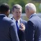 In this file photo, President Joe Biden talks with North Carolina Gov. Roy Cooper and EPA Administrator Michael Regan, after arriving at Raleigh-Durham International Airport, Raleigh, N.C., Thursday, June 24, 2021. (AP Photo/Susan Walsh)