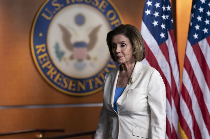 House Speaker Nancy Pelosi of California departs after speaking during a media availability at the Capitol in Washington, Thursday, June 24, 2021. Pelosi announced on Thursday that she's creating a special committee to investigate the Jan. 6 attack on the Capitol, saying it is "imperative that we seek the truth." (AP Photo/Alex Brandon)