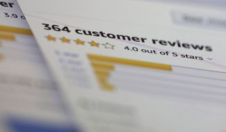 In this April 17, 2019, file photo online customer reviews for a product are displayed on a computer in New York. U.K. regulators are investigating Google and Amazon over concerns the online giants aren&#39;t doing enough to stop fake reviews of products and services on their platforms. The Competition and Markets Authority said Friday, June 25, 2021, it opened a formal investigation into whether the two companies broke U.K. consumer law by failing to protect shoppers. (AP Photo/Jenny Kane, File)