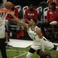 Milwaukee Bucks&#x27; Giannis Antetokounmpo shoots over Atlanta Hawks&#x27; Clint Capela during the second half of Game 2 of the NBA Eastern Conference basketball finals game Friday, June 25, 2021, in Milwaukee. (AP Photo/Morry Gash)