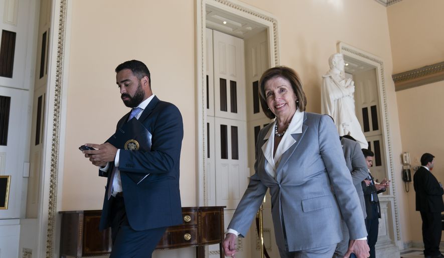 House Speaker Nancy Pelosi of Calif., walks back to her office after the House voted to create a select committee to investigate the Jan. 6 insurrection, at the Capitol in Washington, Wednesday, June 30, 2021. (AP Photo/Alex Brandon)