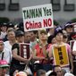 Tens of thousands of Taiwan supporters rally to denounce China in Taipei, Taiwan. (AP Photo/Wally Santana, File)