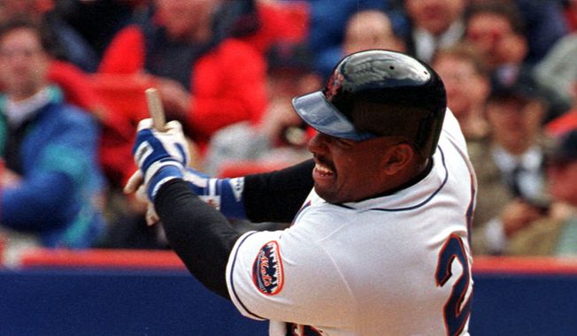 New York Mets&#x27; Bobby Bonilla ends up with a stub of a broken bat as he hits an RBI single during the fifth inning of the Mets home opener against the Florida Marlins in New York Monday, April 12, 1999. The Mets defeated the Marlins 8-1. A promotion announced Thursday, July 1, 2021, that allows a fan to book an Airbnb stay for four at Citi Field for $250 that includes use of the team gym and shower. The promotion includes throwing out the ceremonial first pitch before the Mets play Atlanta on July 28. (AP Photo/Osamu Honda) **FILE**