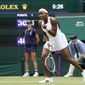 Coco Gauff of the US celebrates winning a point against Russia&#39;s Elena Vesnina during the women&#39;s singles second round match on day four of the Wimbledon Tennis Championships in London, Thursday July 1, 2021. (AP Photo/Alberto Pezzali)