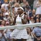 Coco Gauff of the US celebrates winning the women&#39;s singles second round match against Russia&#39;s Elena Vesnina on day four of the Wimbledon Tennis Championships in London, Thursday July 1, 2021. (AP Photo/Alberto Pezzali)