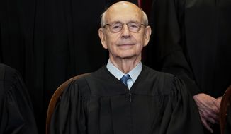 In this April 23, 2021, photo, Supreme Court Associate Justice Stephen Breyer sits during a group photo at the Supreme Court in Washington. (Erin Schaff/The New York Times via AP, Pool) **FILE**