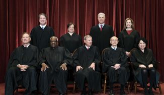 In this April 23, 2021, file photo, members of the Supreme Court pose for a group photo at the Supreme Court in Washington. Seated from left are Associate Justice Samuel Alito, Associate Justice Clarence Thomas, Chief Justice John Roberts, Associate Justice Stephen Breyer and Associate Justice Sonia Sotomayor, Standing from left are Associate Justice Brett Kavanaugh, Associate Justice Elena Kagan, Associate Justice Neil Gorsuch and Associate Justice Amy Coney Barrett. The Supreme Court is wrapping up its first all-virtual term, with decisions expected in a key case on voting rights and another involving information California requires charities to provide about donors. The court&#39;s last day of work Thursday, July 1, before its summer break also could include a retirement announcement, although the oldest of the justices, 82-year-old Stephen Breyer, has given no indication he intends to step down this year. (Erin Schaff/The New York Times via AP, Pool)