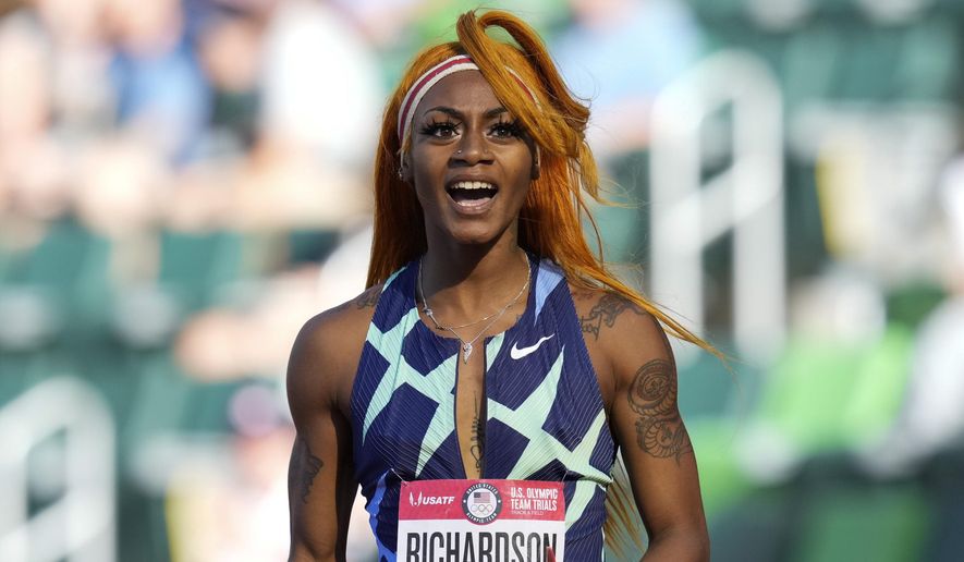 In this June 19, 2021 photo, Sha&#39;Carri Richardson celebrates after winning the first heat of the semis finals in women&#39;s 100-meter runat the U.S. Olympic Track and Field Trials in Eugene, Ore.    Richardson cannot run in the Olympic 100-meter race after testing positive for a chemical found in marijuana.  Richardson, who won the 100 at Olympic trials in 10.86 seconds on June 19, told of her ban Friday, July 2 on the “Today Show.”(AP Photo/Ashley Landis) **FILE**
