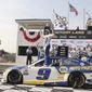 Chase Elliott (9) celebrates his victory in a NASCAR Cup Series auto race Sunday, July 4, 2021, at Road America in Elkhart Lake, Wis. (AP Photo/Jeffrey Phelps)