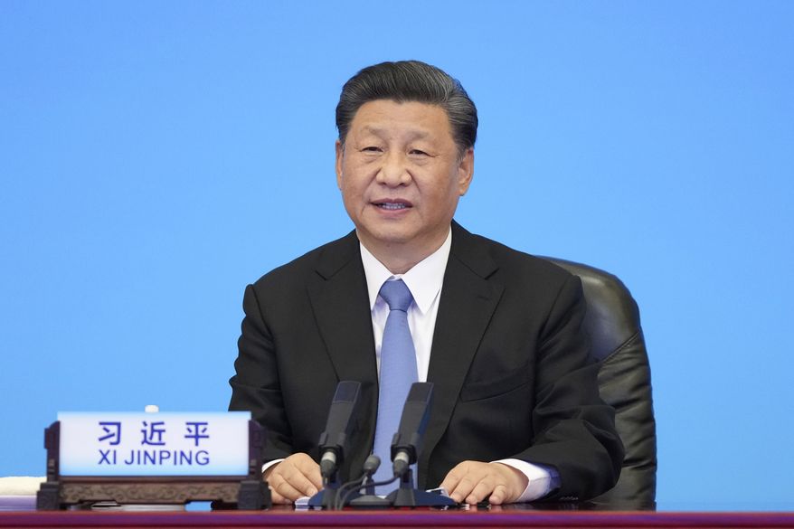 In this photo released by Xinhua News Agency, Chinese President Xi Jinping delivers a speech at the CPC and World Political Parties Summit held in Beijing Tuesday, July 6, 2021. (Li Xueren/Xinhua via AP) ** FILE **