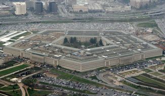 This March 27, 2008, file photo shows the Pentagon in Washington. The Pentagon said Tuesday, July 6, 2021, that it is canceling a cloud-computing contract with Microsoft that could eventually have been worth $10 billion and will instead pursue a deal with both Microsoft and Amazon. (AP Photo/Charles Dharapak) ** FILE **