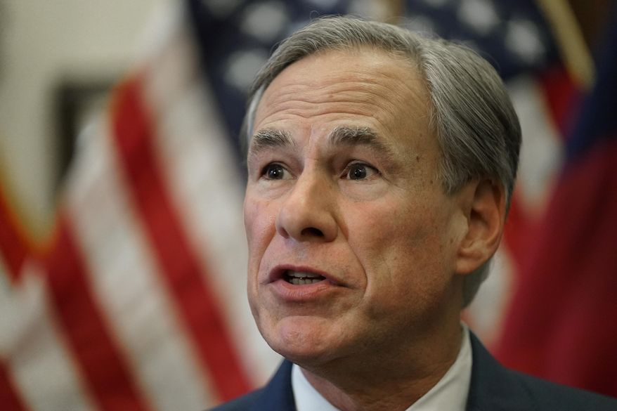 FILE - In this Tuesday, June 8, 2021, file photo, Texas Gov. Greg Abbott speaks at a news conference in Austin, Texas. Abbott is reviving the GOP’s thwarted efforts to pass new voting laws in America’s biggest red state. His announcement Wednesday, July 7, comes after Democrats temporarily derailed a restrictive bill with a late-night walkout in the state Capitol in May. (AP Photo/Eric Gay, File)