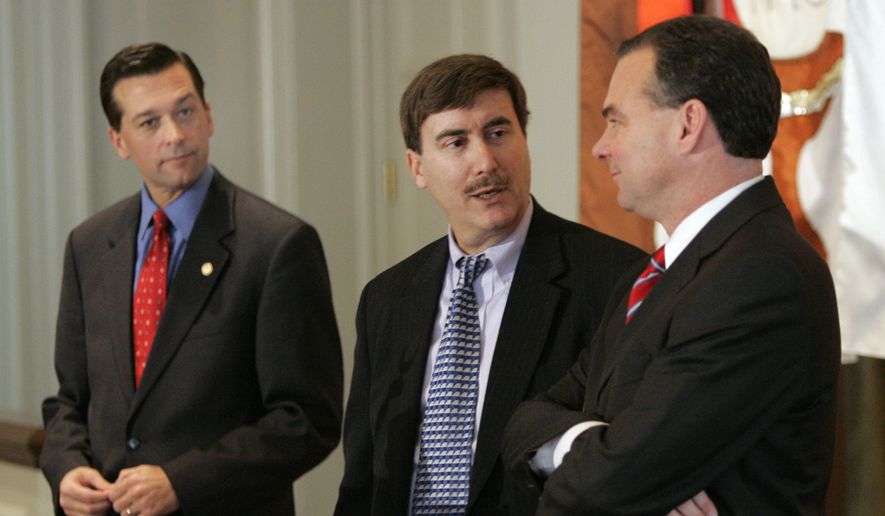 Virginia Attorney General Jerry Kilgore, left, looks on as debate moderator and University of  Virginia political science professor Larry J Sabato, center, and Lt. Gov. Tim Kaine, right, talk prior to a debate sponsored by the Virginia Associated Press Managing Editors Association in Richmond, Va., Wednesday, Dec. 8, 2004. Kilgore, a Republican, who plans to formally announce his candidacy for governor later next year, is expected to be opposed in the race by Kaine, a Democrat. (AP Photo/Steve Helber) **FILE**