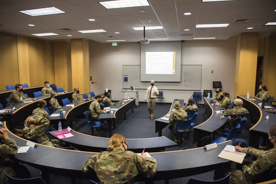 In this image provided by the U.S. Air force Academy, cadets start the school year with a mix of reduced class sizes and remote learning on Aug. 12, 2020, at the U.S. Air Force Academy in Colorado Springs, Colo. (Trevor Cokley/U.S. Air Force Academy via AP) ** FILE **