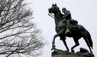 FILE - A statue of Stonewall Jackson is seen uncovered in Justice Park, in Charlottesville, Va., on Wednesday, Feb. 28, 2018.  Charlottesville said in a news release Friday, July 9, 2021,   that the equestrian statue of Confederate Gen. Robert E. Lee as well as a nearby one of Confederate Gen. Thomas “Stonewall” Jackson will be taken down Saturday.(Zack Wajsgras/The Daily Progress via AP)