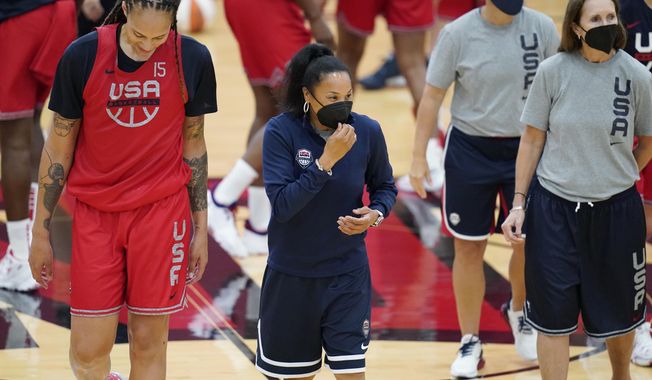 Head coach Dawn Staley, center, coaches during practice for the United States women&#x27;s basketball team in preparation for the Olympics, Tuesday, July 13, 2021, in Las Vegas. (AP Photo/John Locher)