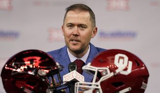Oklahoma head football coach Lincoln Riley speaks from the stage during NCAA college football Big 12 media days Wednesday, July 14, 2021, in Arlington, Texas. (AP Photo/LM Otero)