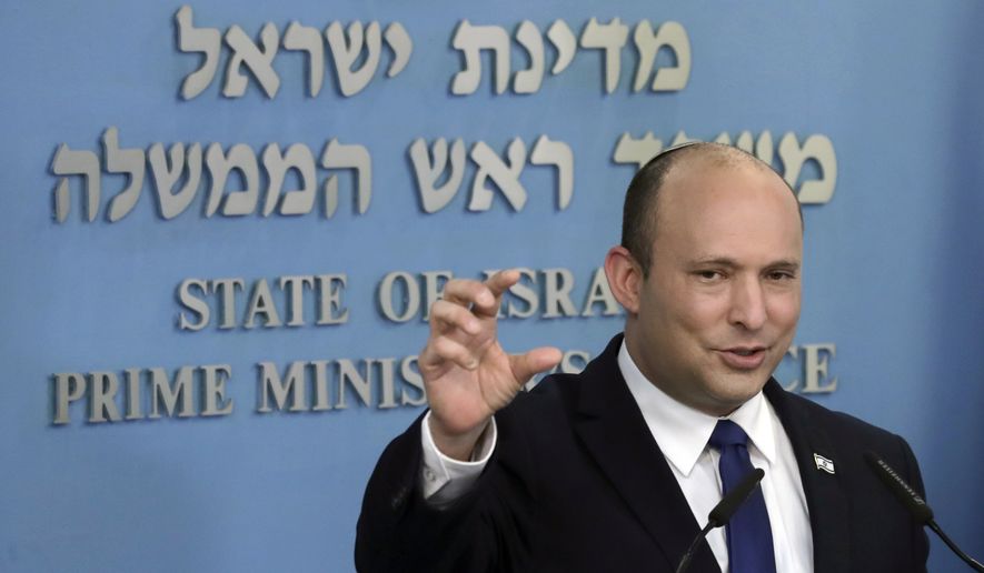Israel&#39;s Prime Minister Naftali Bennett delivers a statement in Jerusalem, Wednesday, July 14, 2021. (AP Photo/Maya Alleruzzo)