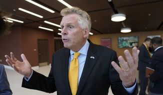 Virginia Democratic gubernatorial candidate Terry McAuliffe gestures during an interview at Norfolk State University on Thursday, July 15, 2021. (AP Photo/Steve Helber) **FILE**