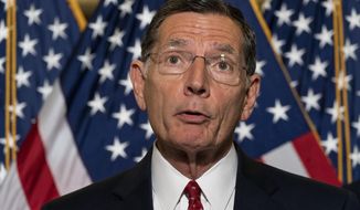 Sen. John Barrasso, R-Wyo., speaks with reporters after a Republican caucus luncheon on Capitol Hill in Washington.  (AP Photo/Alex Brandon, File)
