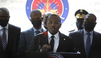 Haiti&#x27;s interim Prime Minister Claude Joseph gives a press conference in Port-au-Prince, Friday, July 16, 2021, the week after the assassination of Haitian President  Jovenel Moïse’s on July 7. (AP Photo/Joseph Odelyn)
