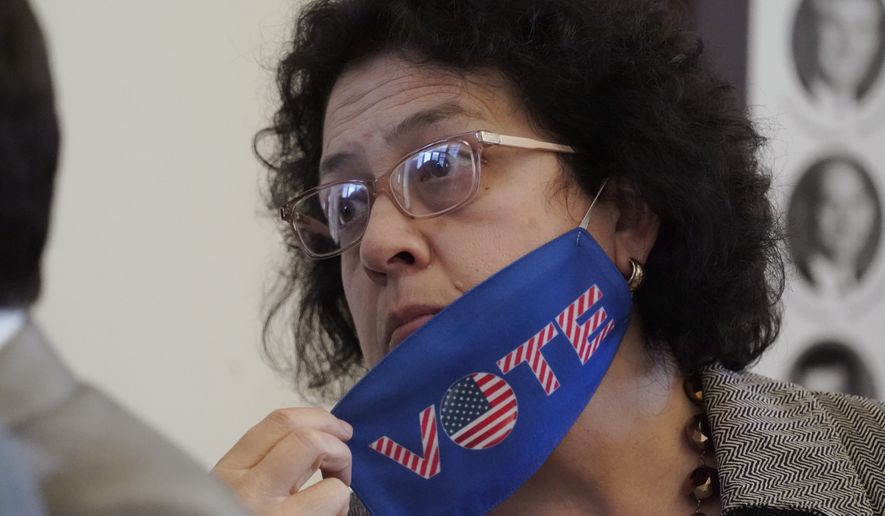 “I would not change anything to protect the right to vote,” Democratic state Rep. Celia Israel said. She said her diagnosis shows “sacrifice.” (Associated Press photograph)