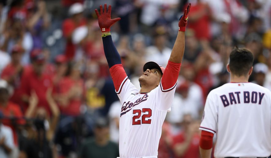 Washington Nationals&#x27; Juan Soto (22) celebrates his two-run home run during the eighth inning of the team&#x27;s baseball game against the San Diego Padres, Sunday, July 18, 2021, in Washington. The Nationals won 8-7. (AP Photo/Nick Wass)