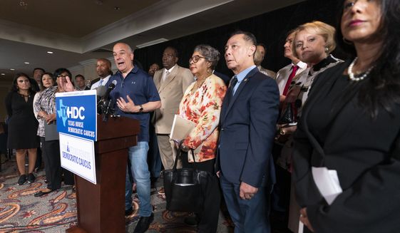 Democratic Texas State Rep. Chris Turner, left, from Grand Prairie, speaks during a news conference with other Texas Democrats, Wednesday, July 14, 2021, in Washington. (AP Photo/Manuel Balce Ceneta) ** FILE **