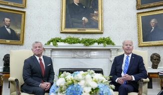 President Joe Biden, right, meets with Jordan&#x27;s King Abdullah II, left, in the Oval Office of the White House in Washington, Monday, July 19, 2021. (AP Photo/Susan Walsh)