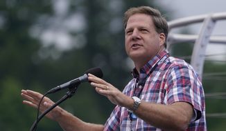 New Hampshire Governor Chris Sununu at a NASCAR Cup Series auto race, Sunday, July 18, 2021, in Loudon, N.H. (AP Photo/Charles Krupa) **FILE**