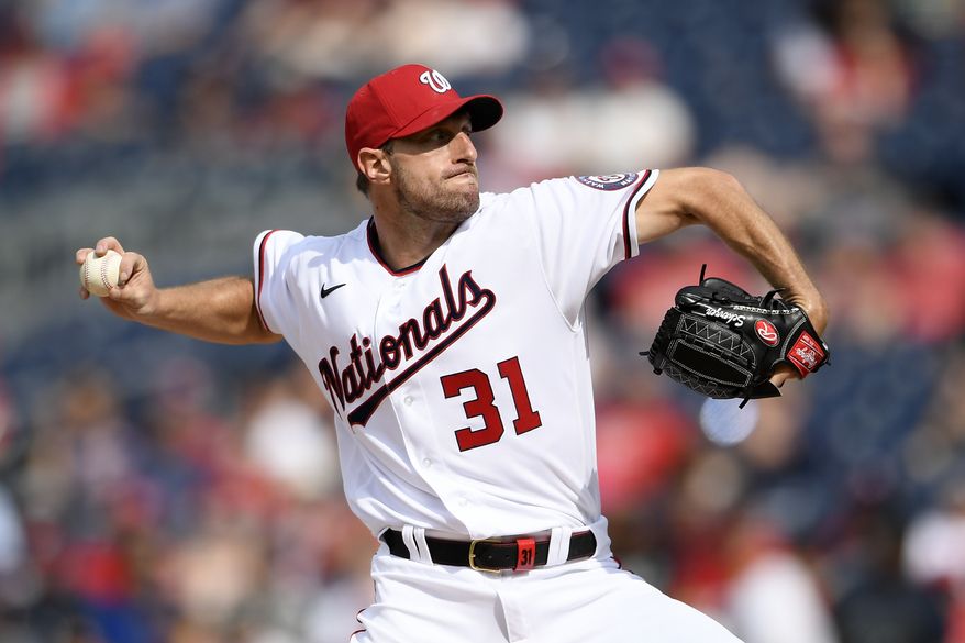 Washington Nationals starting pitcher Max Scherzer delivers a pitch during a baseball game against the San Diego Padres, Sunday, July 18, 2021, in Washington. (AP Photo/Nick Wass)
