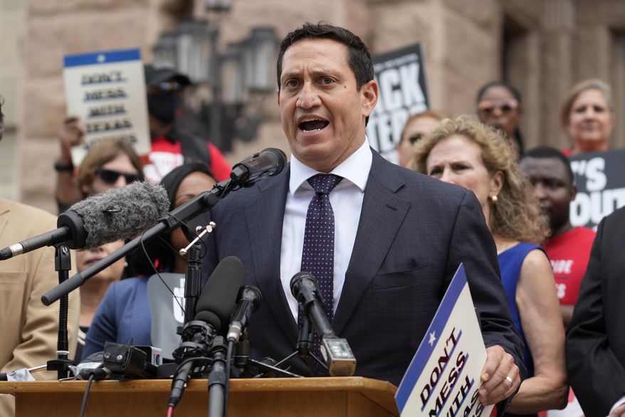 In this Thursday, July 8, 2021, photo, Rep. Trey Martinez Fischer, D-San Antonio, speaks at a rally on the steps of the Texas Capitol in Austin, Texas, to support voting rights. (AP Photo/Eric Gay) ** FILE **