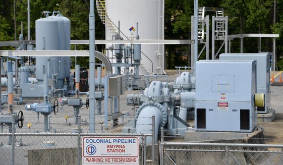 In this May 11, 2021, photo, a Colonial Pipeline station is seen in Smyrna, Ga., near Atlanta. The Department of Homeland Security has announced new requirements for U.S. pipeline operators to bolster cybersecurity following a May ransomware attack that disrupted gas delivery across the East Coast. (AP Photo/Mike Stewart) **FILE**